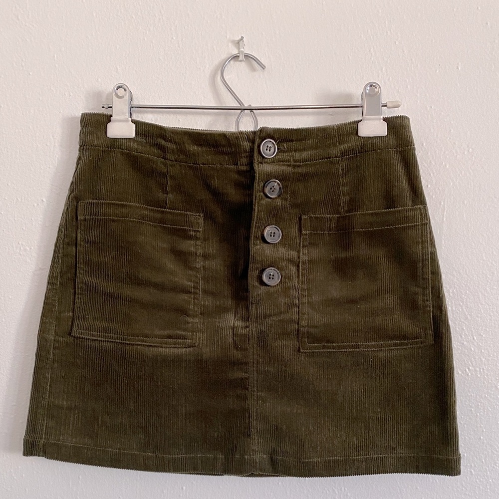 Green corduroy mini skirt